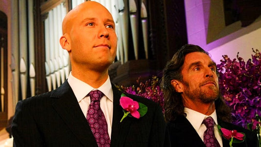 John Glover como Lionel Luthor junto a Michael Rosenbaum como Lex Luthor, en Smallville