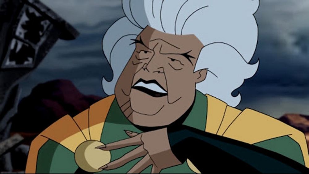 Granny Goodness, pelo blanco y esfera dorada, en la serie animada