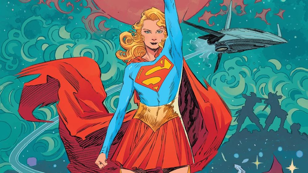 Supergirl con capa roja y el puño en alto, sobre un fondo de volutas turquesa
