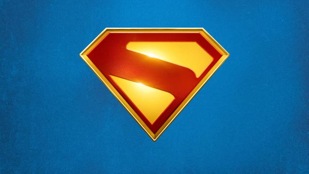 El emblema de la S de Superman, rojo y oro, sobre un fondo azul